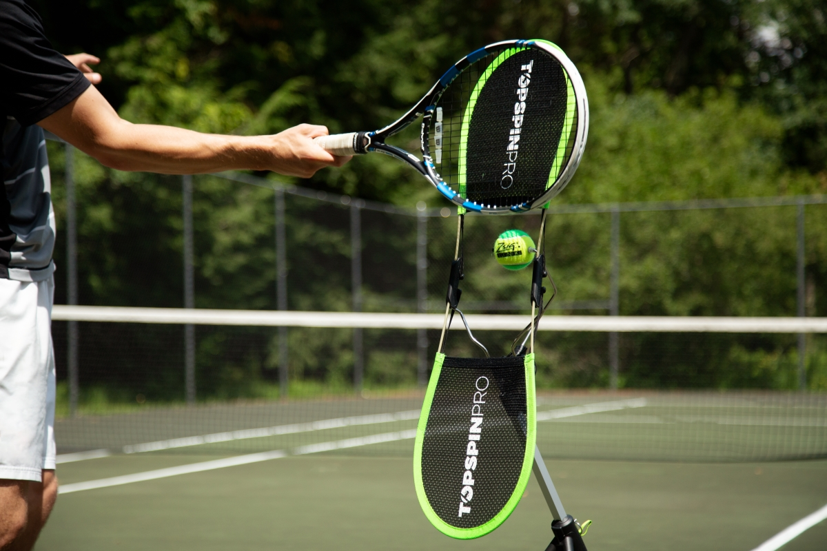 Practicing with the TopspinPro on court