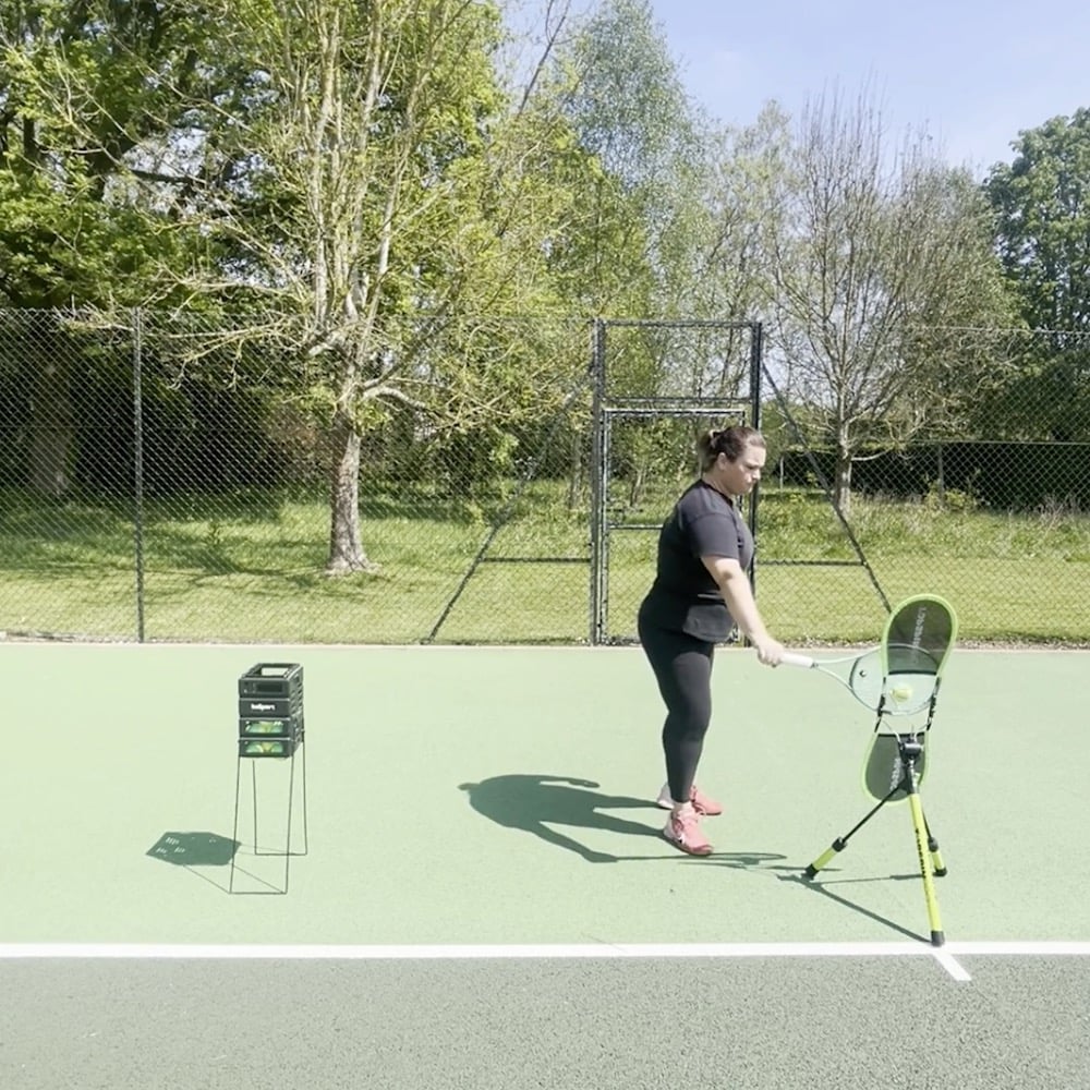Zoe demonstrating the one-handed backhand with TopspinPro