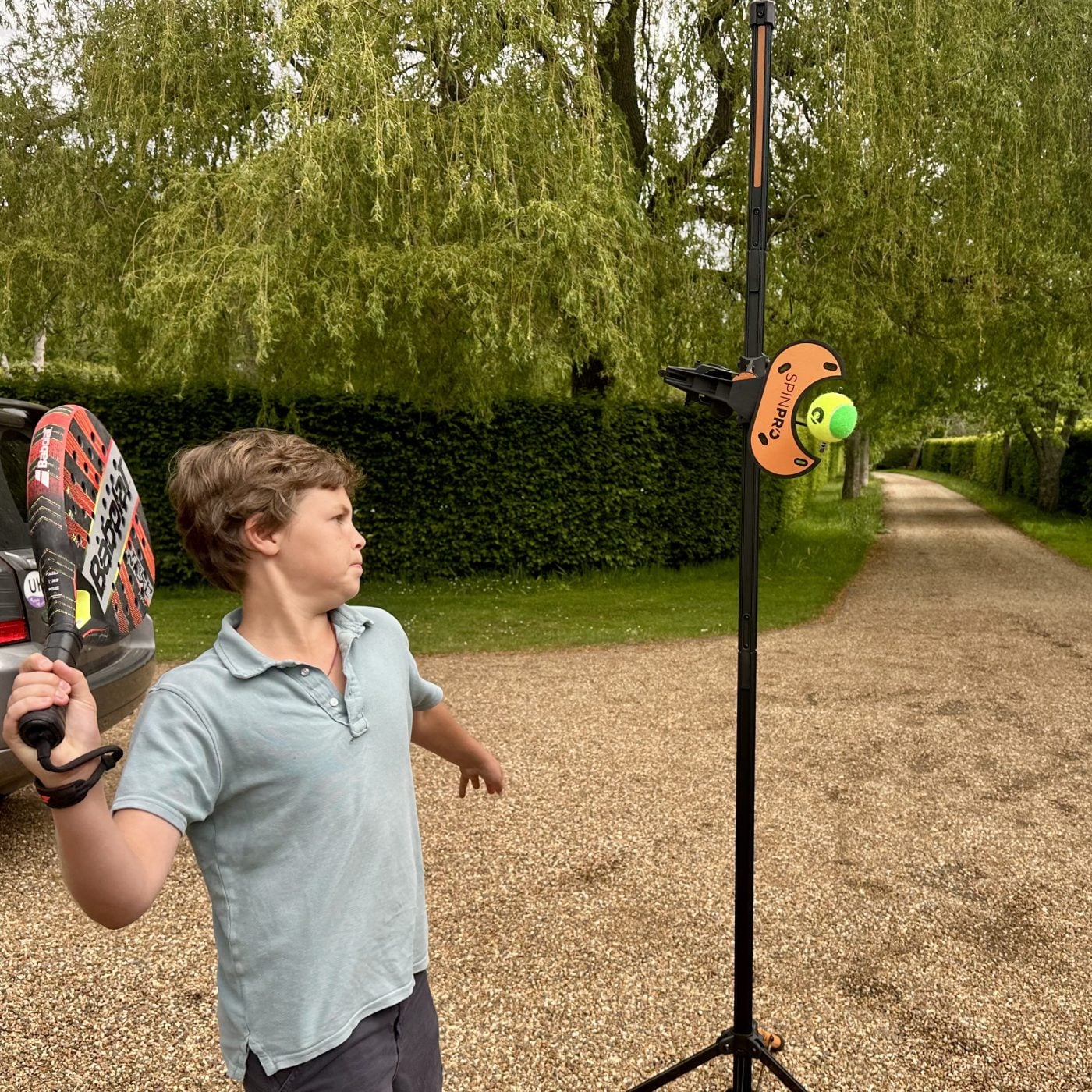 A player practising with the SpinPro at home